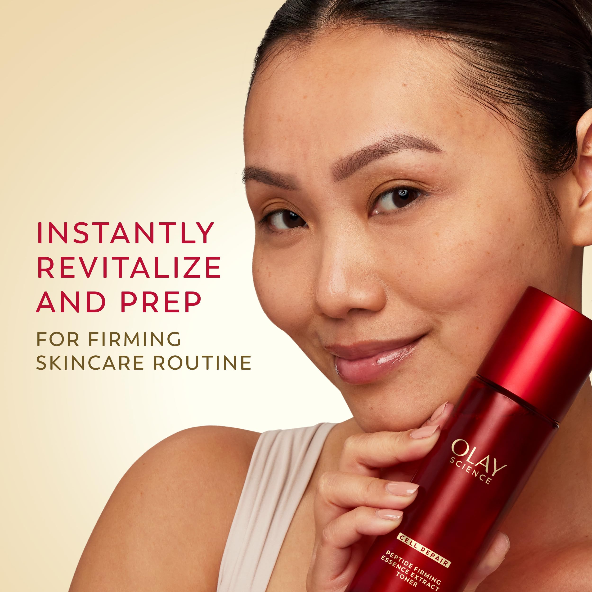 Olay Science essence on cotton pad showing soak and sweep benefit: gentle toning