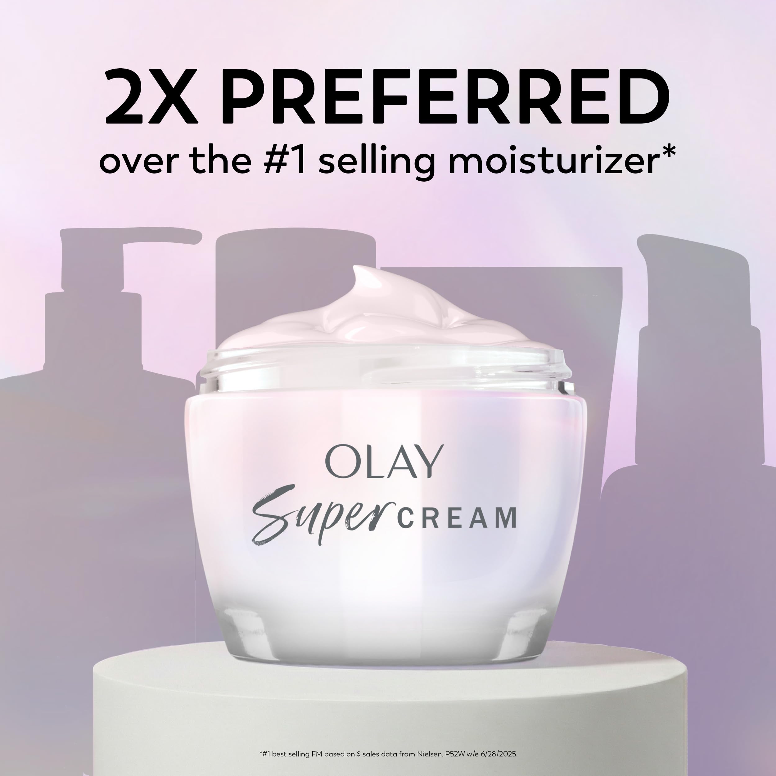 Cream on fingertips from Olay showing lightweight spreadable benefit