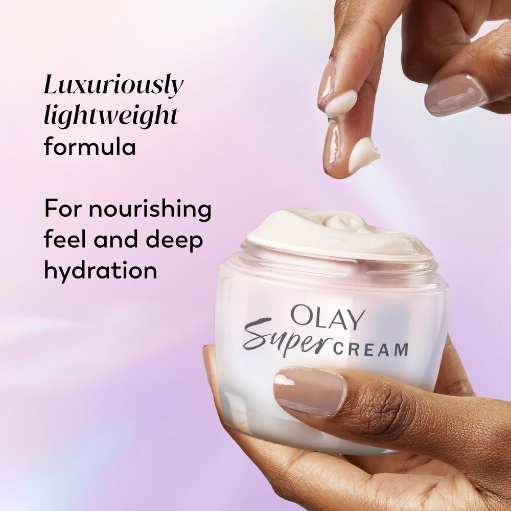 Olay beside a coin for size comparison and travel-ready benefit