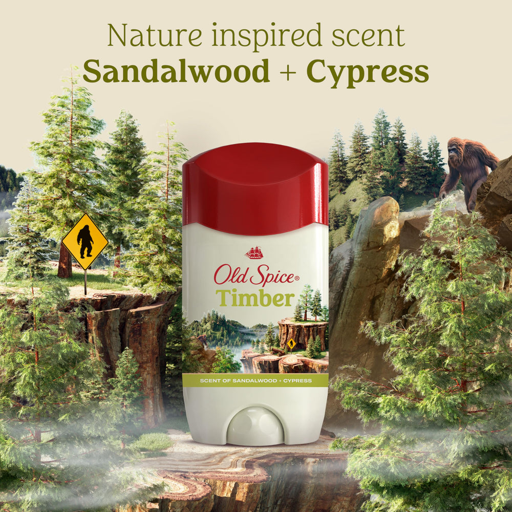 Old Spice Timber next to a hand for size comparison showing compact 2.6 oz portability