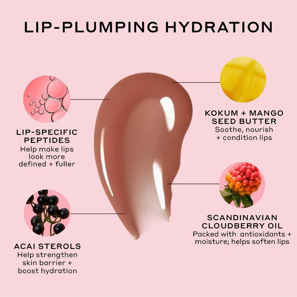 Ole Henriksen lifestyle application on lips demonstrating plump, shiny result benefit