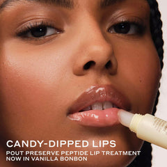 Ole Henriksen texture close-up of creamy lip treatment, showing glossy finish and moisturizing benefit