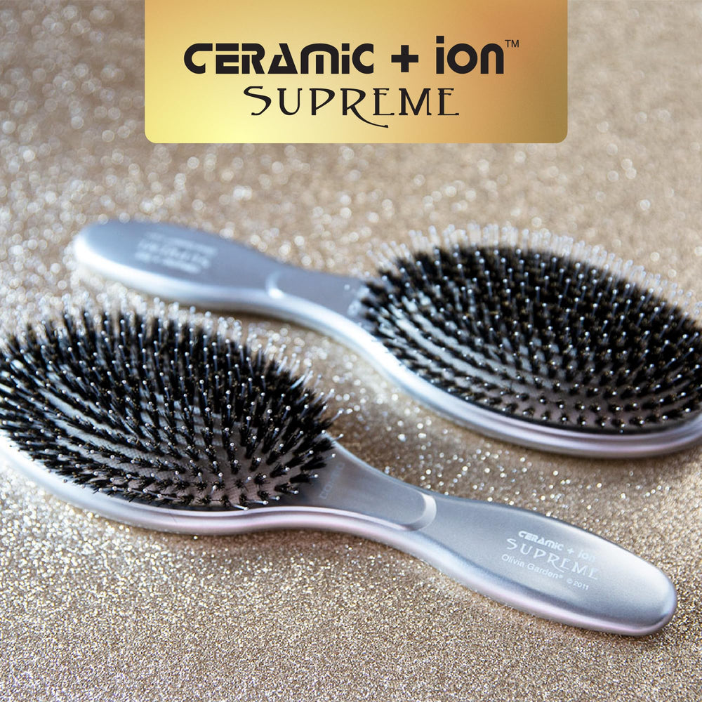 Olivia Garden brush held in hand showing size and easy control