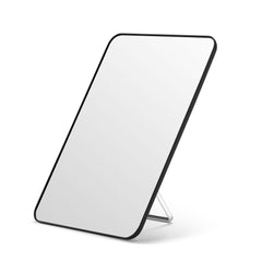 OMIRO front view of 10x7 mirror showing clear reflection and sleek black frame for precise grooming