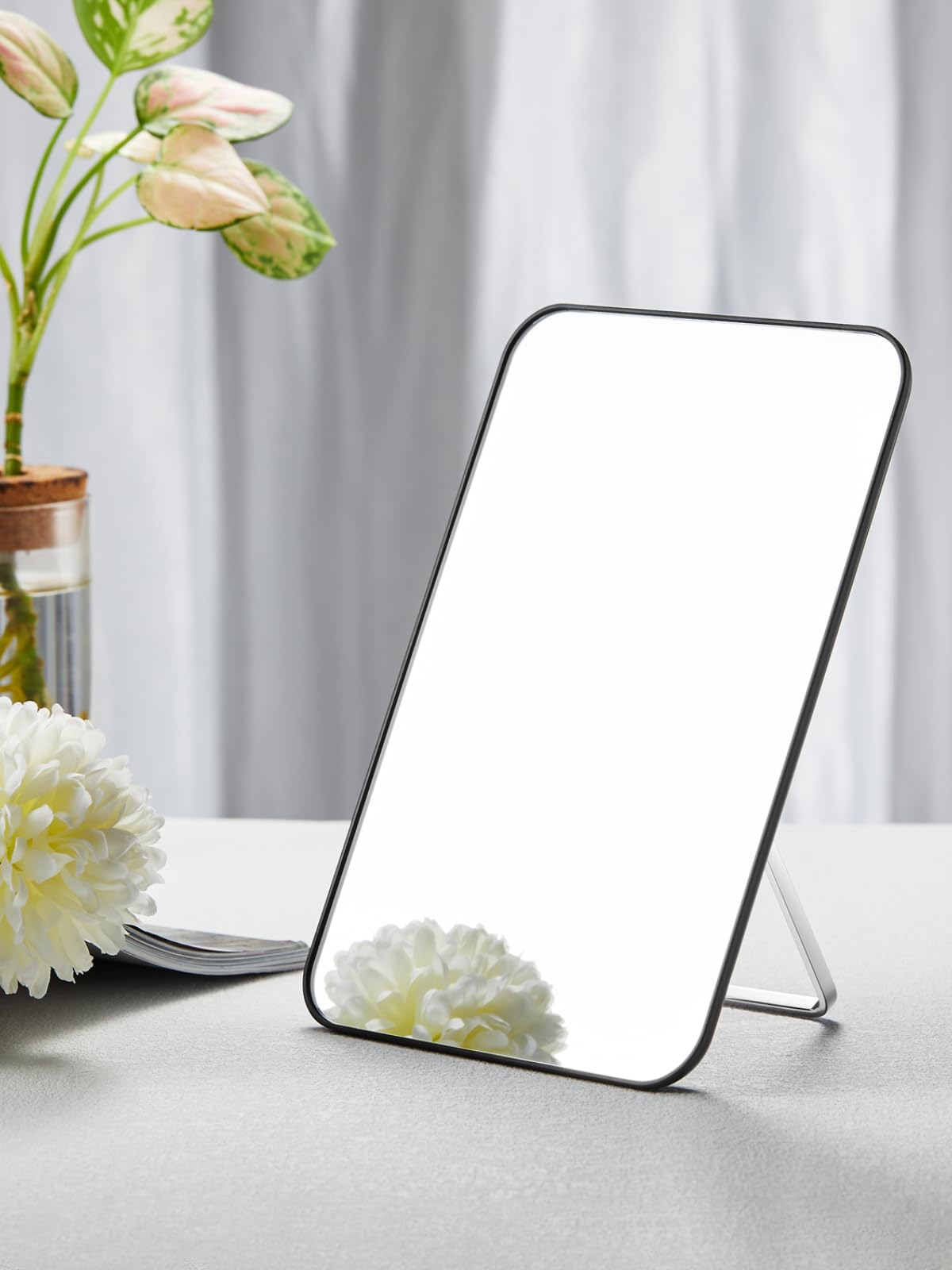 OMIRO mirror on dresser in lifestyle scene offering wide view for makeup and daily touch-ups