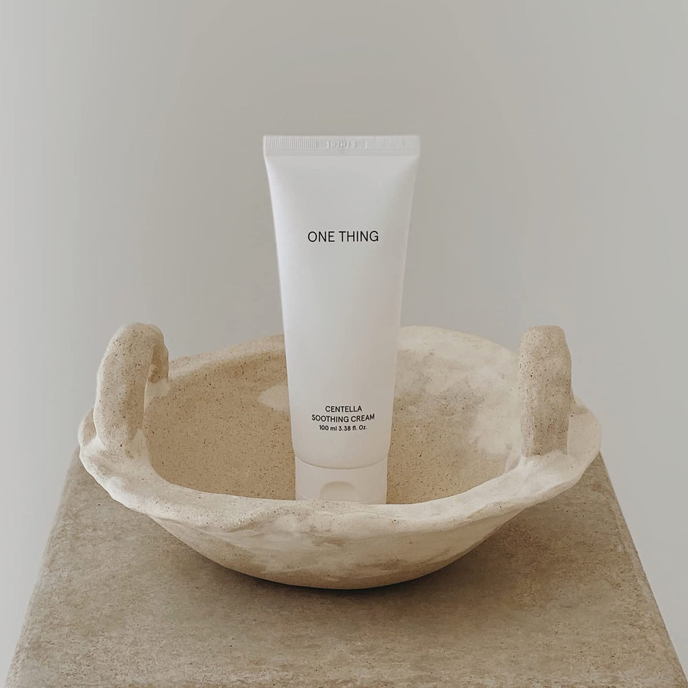 ONE THING on bathroom shelf presenting routine-friendly skincare
