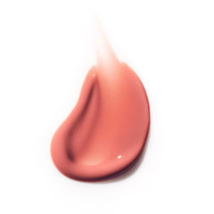 OneSkin OS-01 lip balm texture close-up highlighting smooth hydration and spreadability