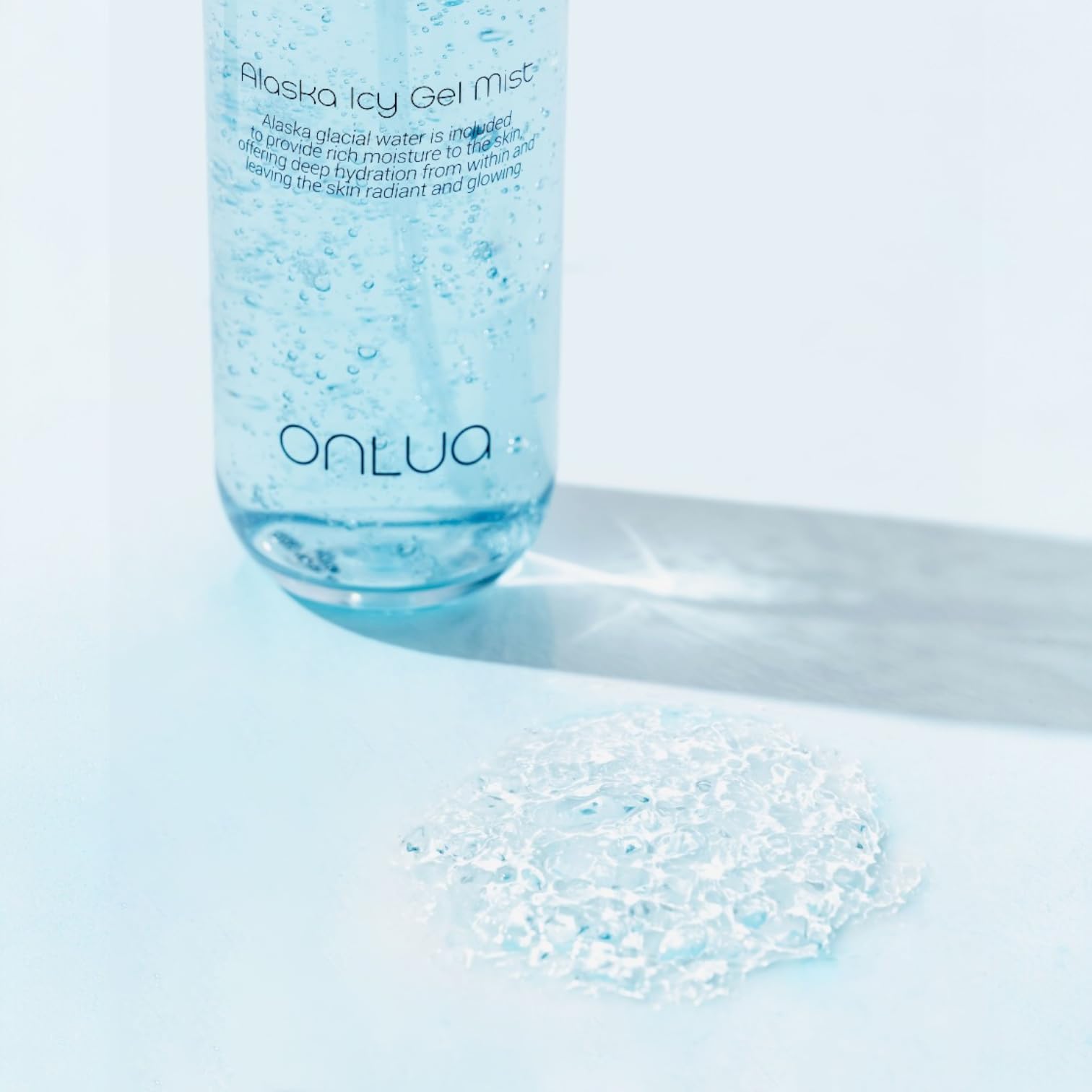 Onlua applied over makeup demonstrating dewy, non-smudging finish
