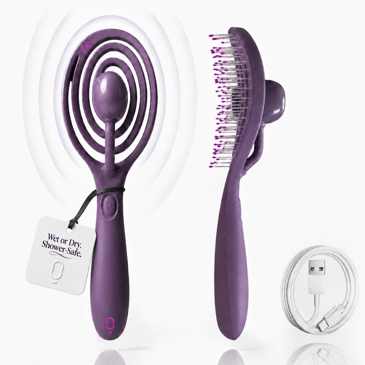 OO! brush front view showing ergonomic grip and detangling surface for easier brushing