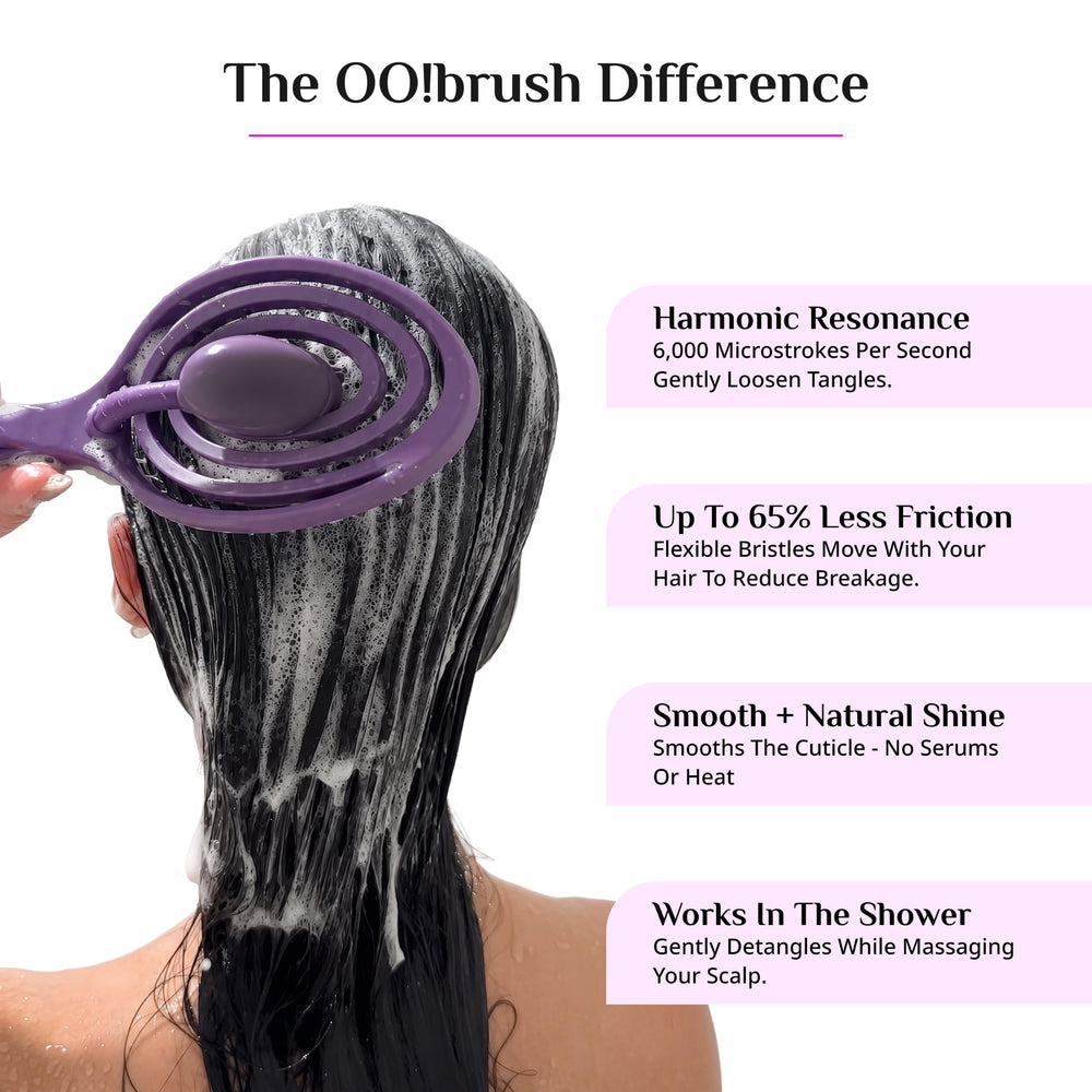 OO! brush detangling curly hair in use showing reduced tug and smoother finish