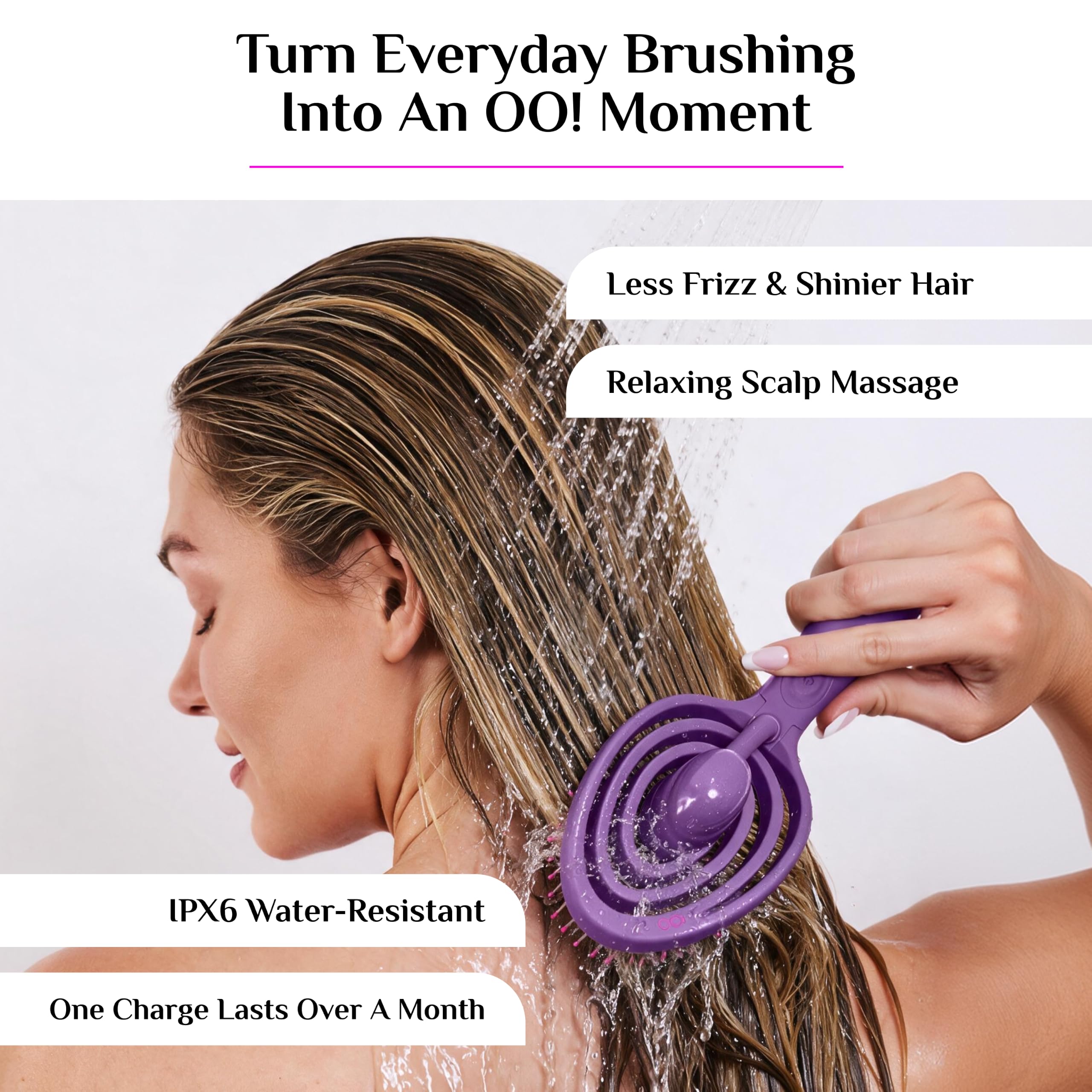 OO! brush held wet in hand to show water-resistant construction and shower use convenience