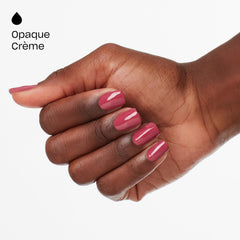OPI bottle angled with light reflection showing glossy fuchsia-berry sheen