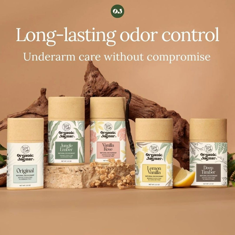 Organic Jaguar deodorant placed on wood with foliage to show Deep Timber scent benefit