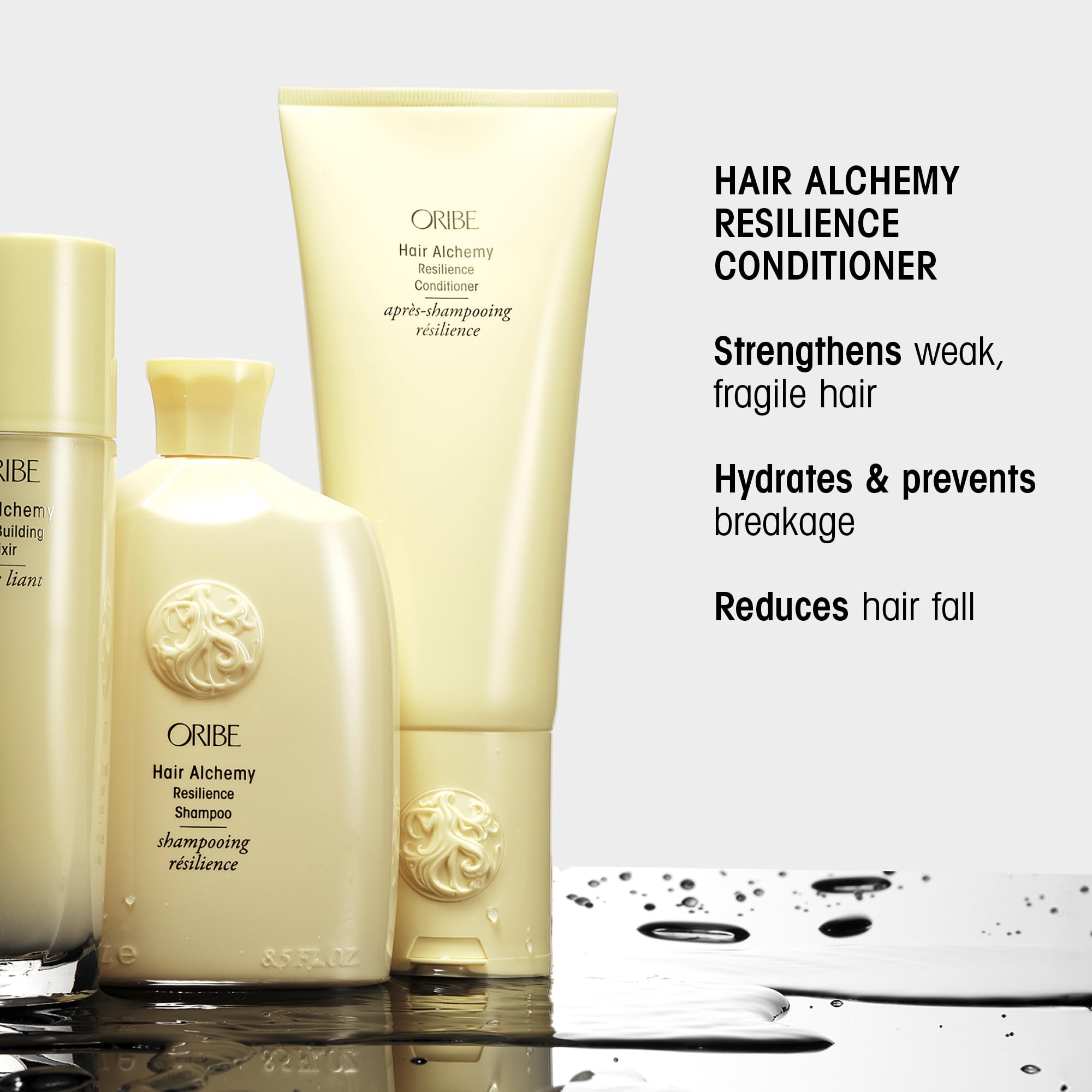 ORIBE bottle held in hand to show 6.8oz scale and travel practicality