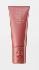 Oribe Bright Blonde conditioner in bathroom lifestyle demonstrating ease of use and visibly brighter, softer blonde hair