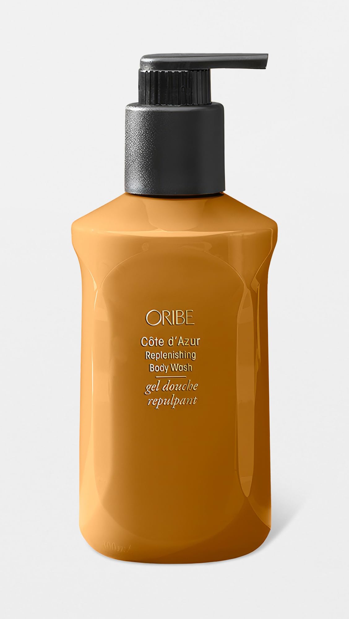 ORIBE close-up pearlescent gel texture demonstrating creamy lather benefit