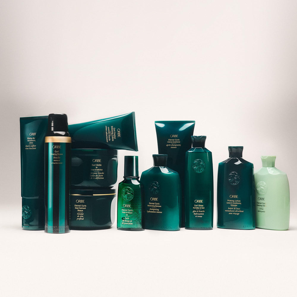 Oribe styling cream in beach setting showing humidity resistance and movement