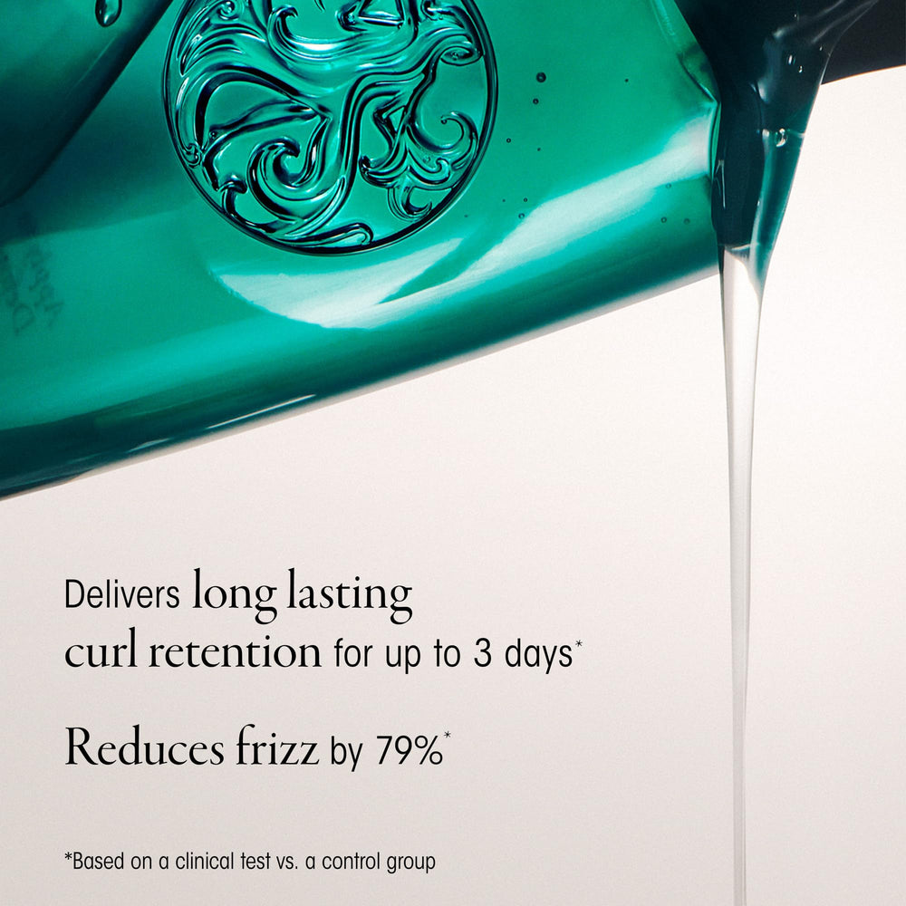 Oribe Curl Gloss in hand to show 5.9oz size and product scale
