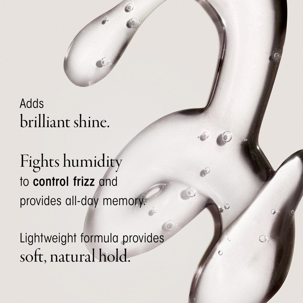 Oribe Curl Gloss being dispensed from pump showing easy application