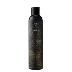 Oribe dry texturizing spray front bottle shows elegant packaging and brand prestige