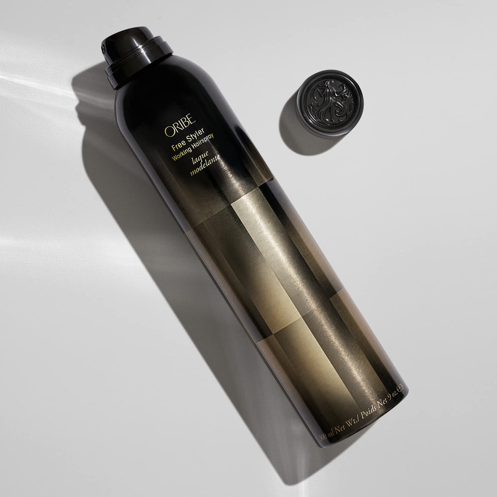 ORIBE Free Styler ultra-fine mist close-up illustrating even application and control