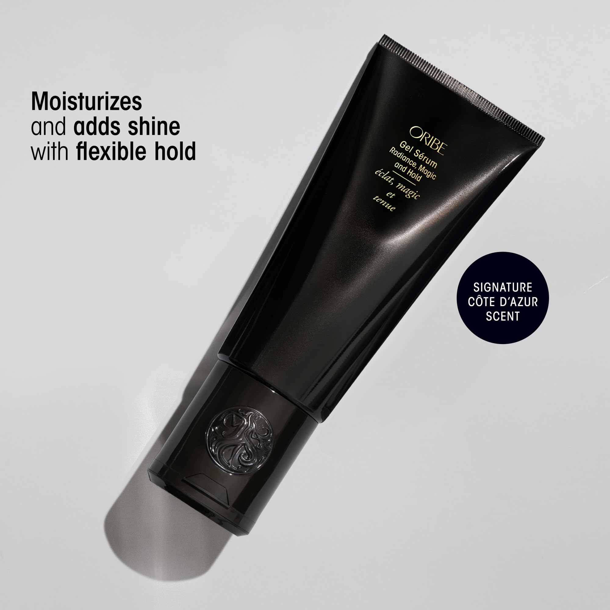Oribe gel serum texture dispensed on palm showing lightweight gel-serum benefit