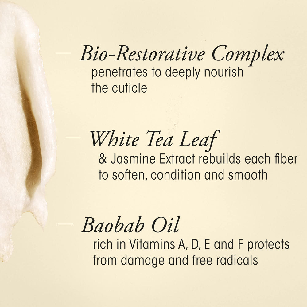 ORIBE jar held in hand to show the 5oz size and convenient travel-ready benefit