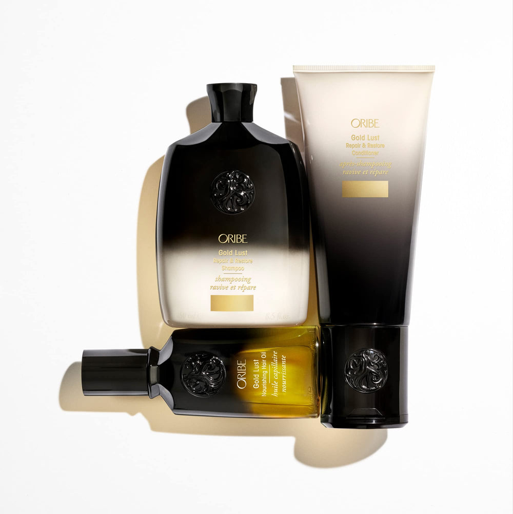 Applying Oribe oil to damp hair demonstrating detangling and heat prep benefit
