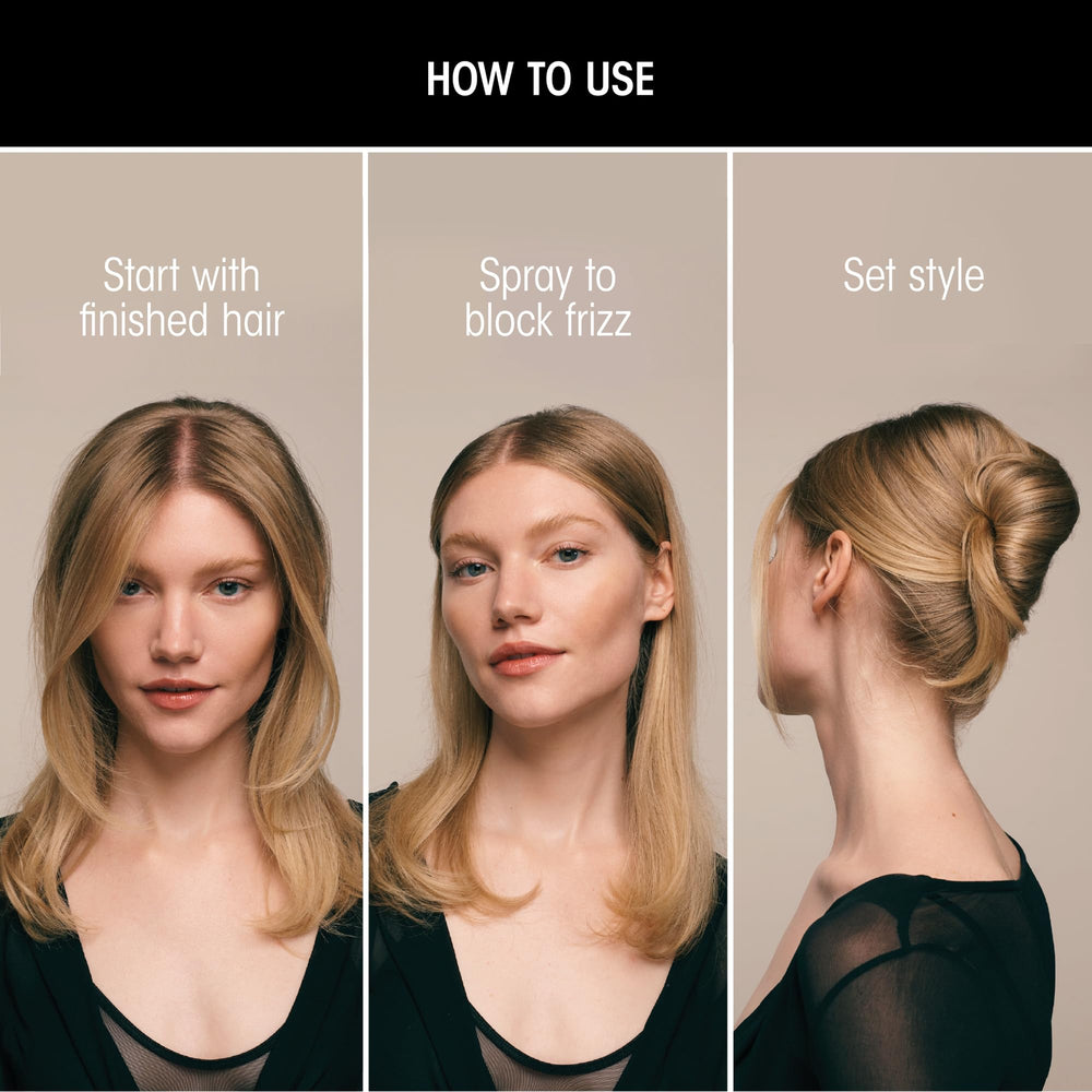 Oribe bottle held in hand to show 5.5oz scale and travel readiness