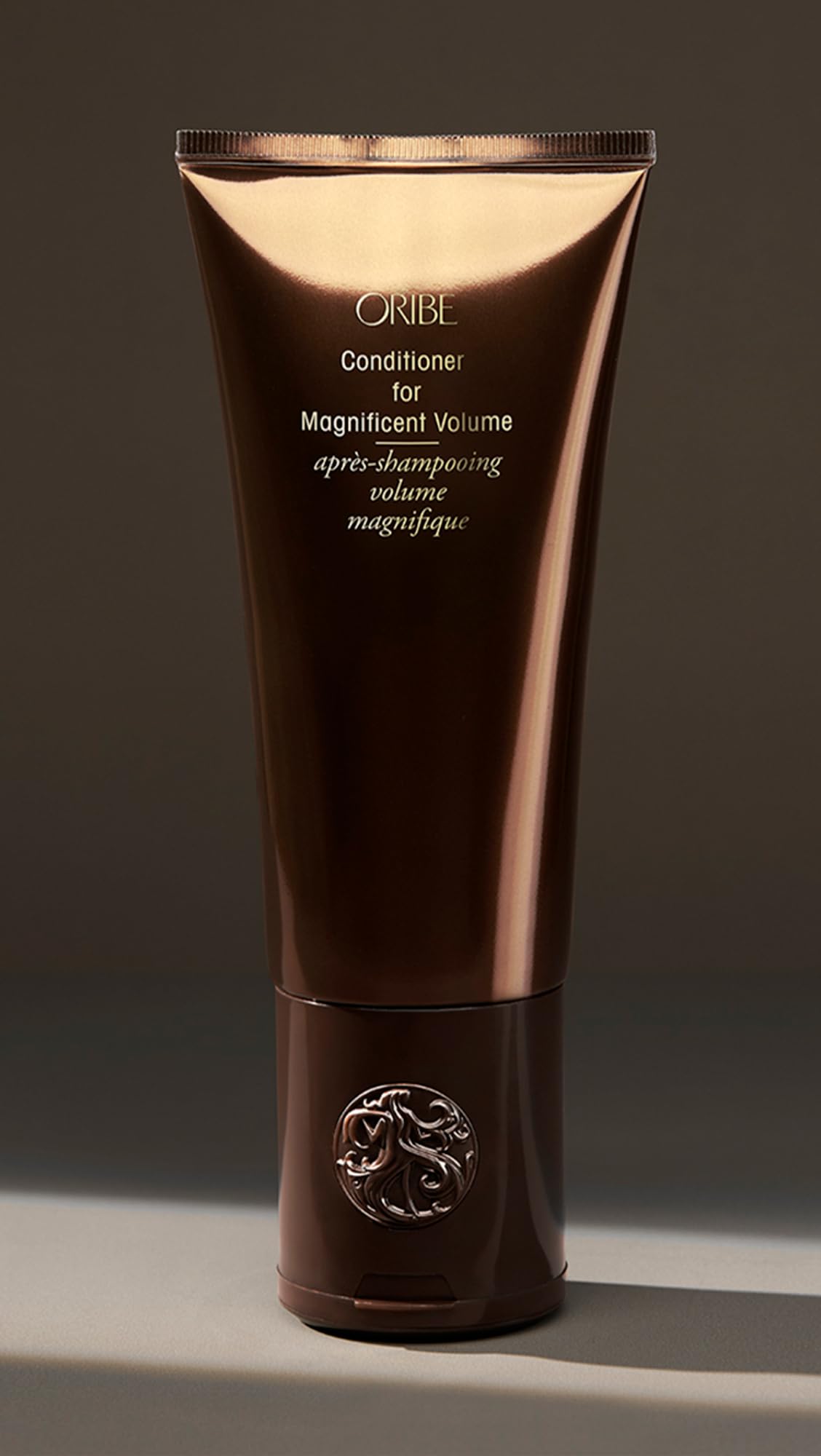 Oribe product label close-up highlighting vegan, cruelty-free, color-safe claims for confident choice