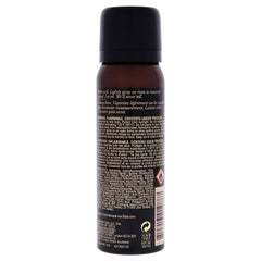 Oribe Root Touch-Up applied in salon to conceal regrowth quickly and discreetly