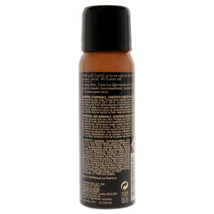 Oribe Root Touch-Up Spray applied on hair part to instantly conceal roots and reduce oil appearance