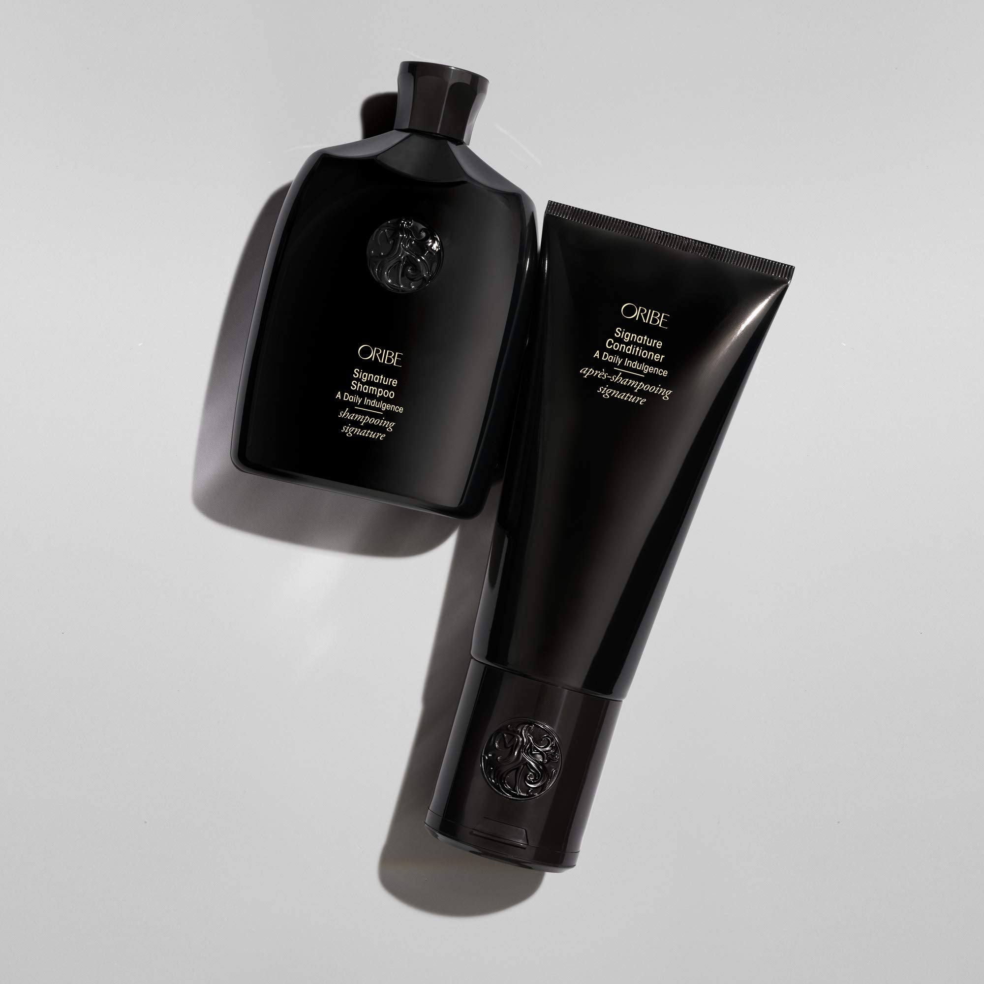 Back label of Oribe conditioner showing directions and clean-formula benefits