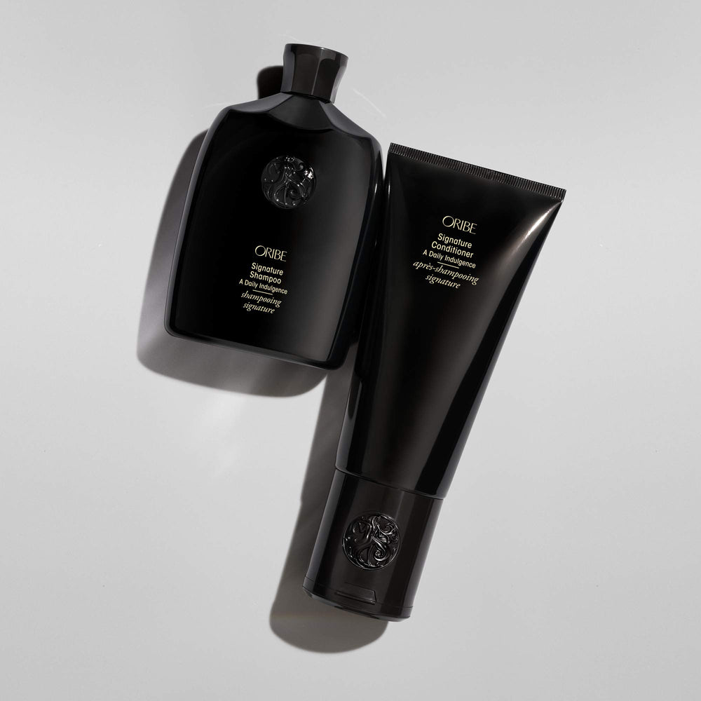 Back label of Oribe conditioner showing directions and clean-formula benefits