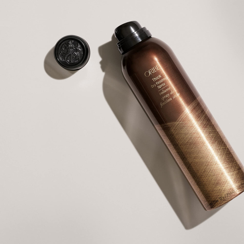 Close-up of Oribe spray mist texture illustrating lightweight volumizing effect