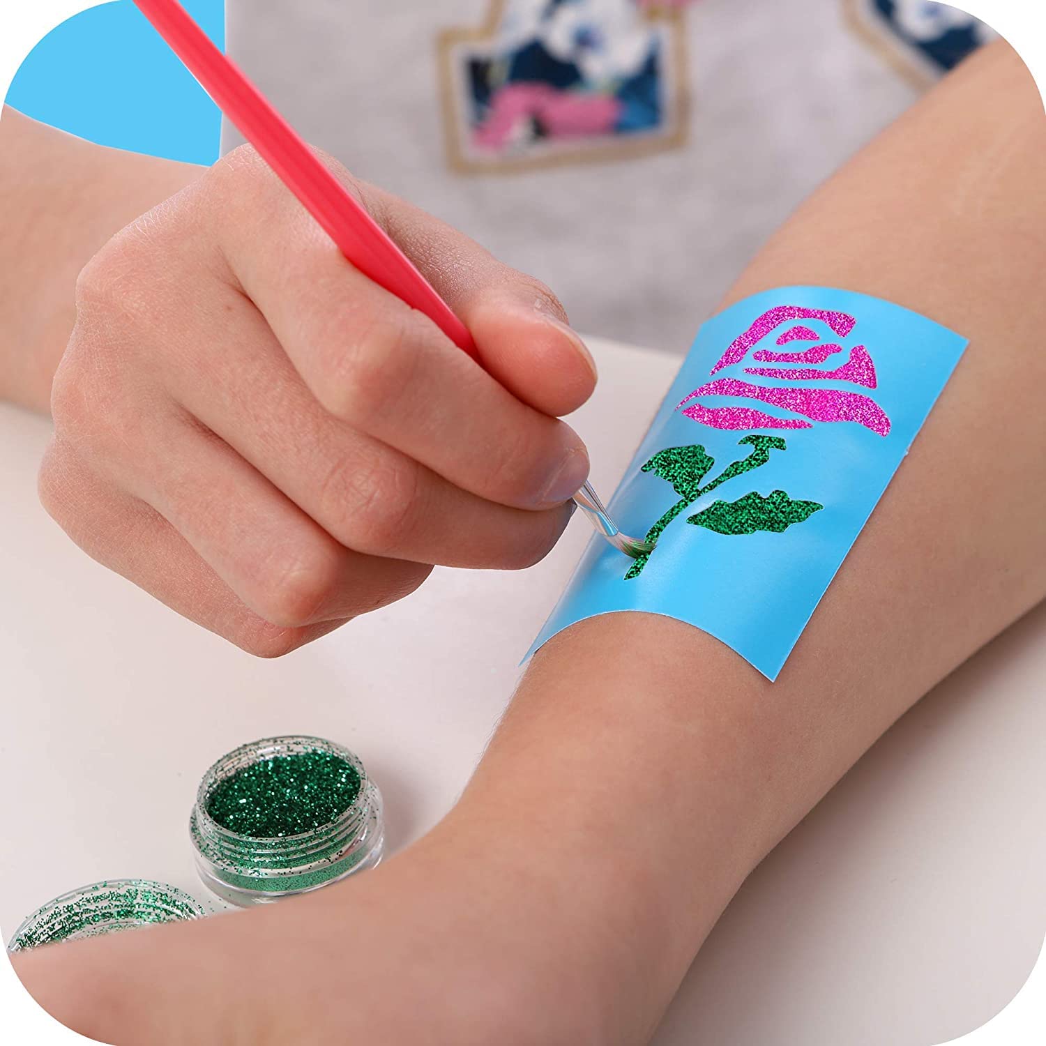 Original Stationery finished designs on arm showcasing colorful temporary tattoos