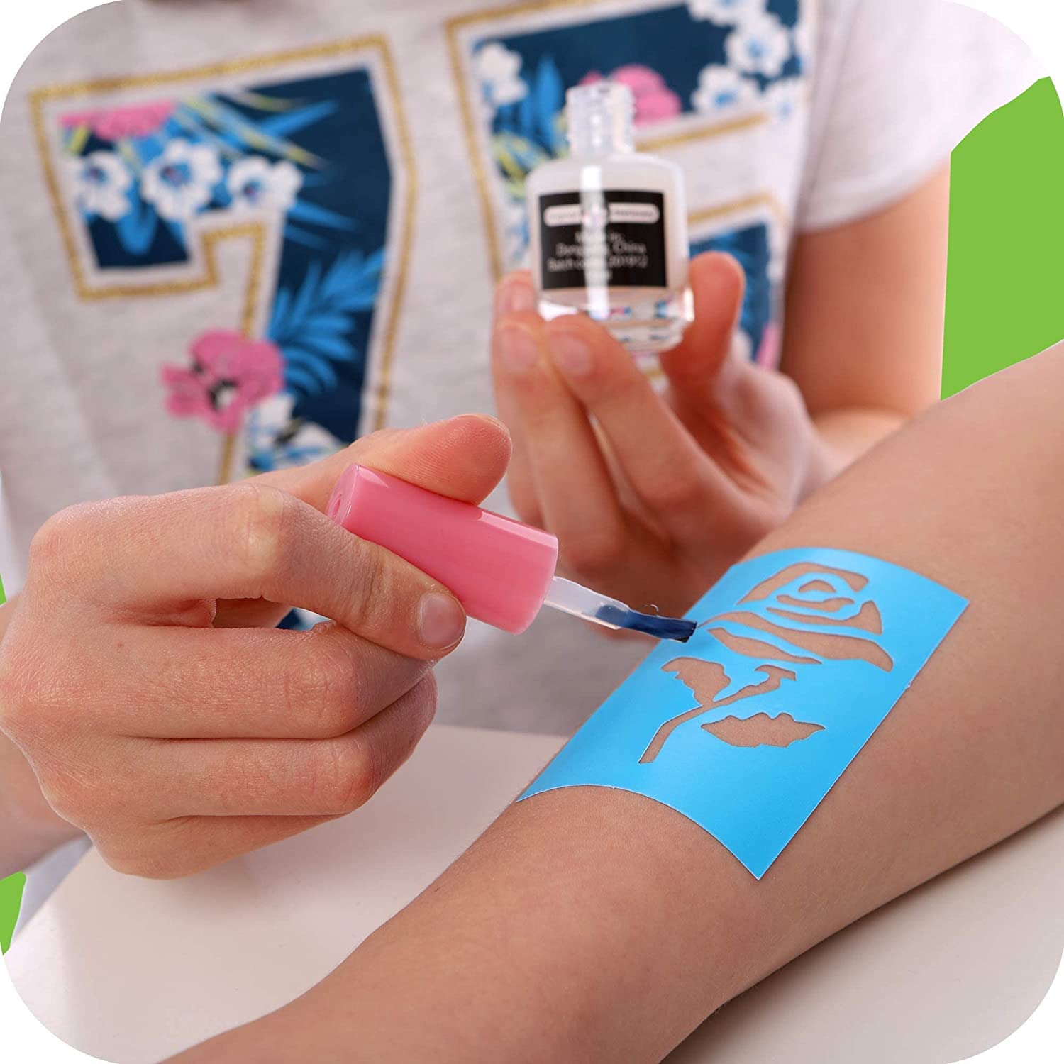 Original Stationery kid applying tattoo demonstrating simple step-by-step use