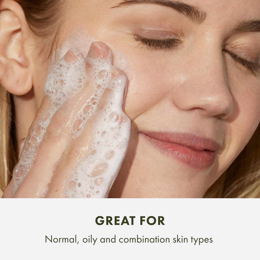 Origins GinZing citrus ingredients arrangement emphasizing grapefruit lemon scent uplift