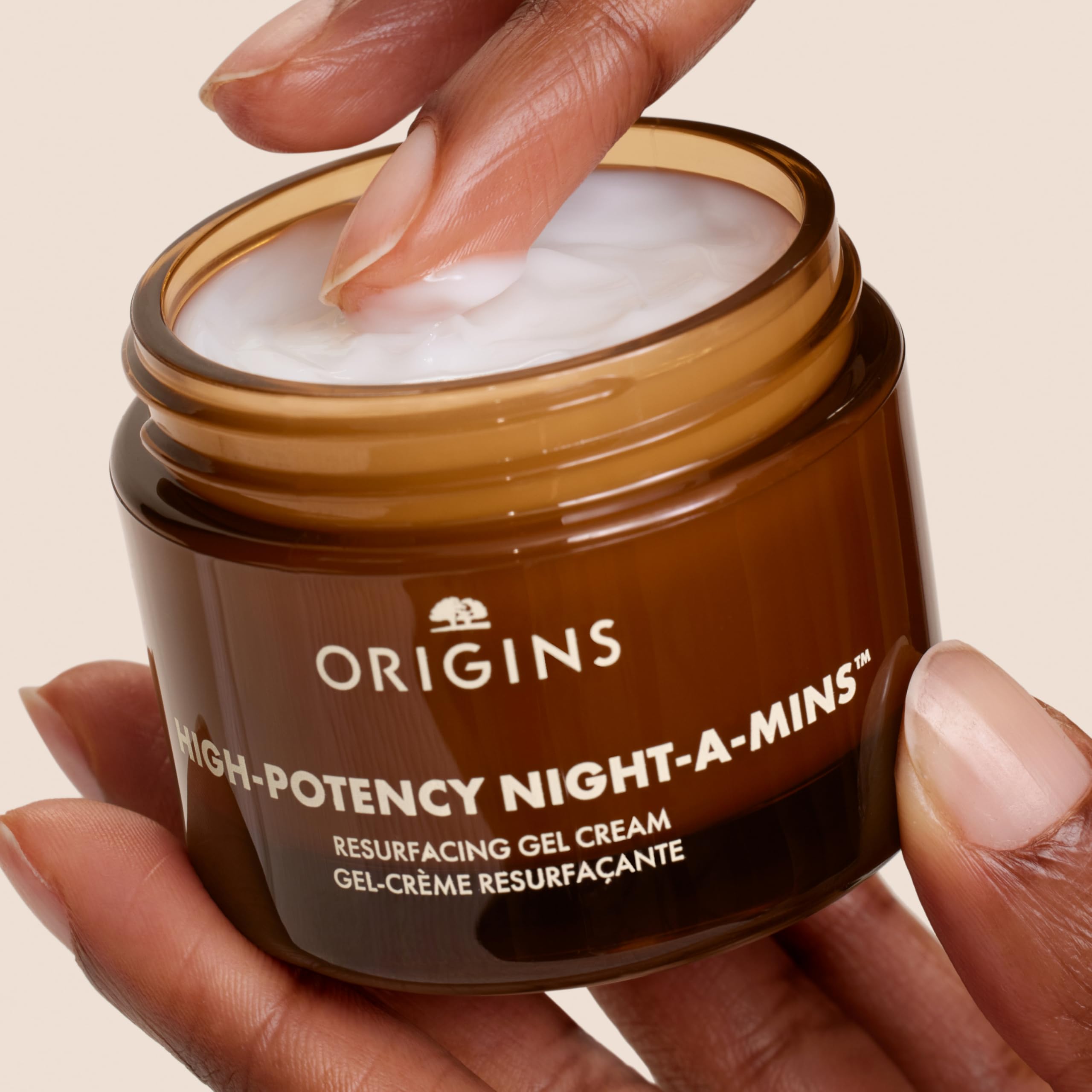 Origins gel being applied to back of hand demonstrating easy spread and fast absorption