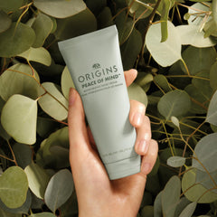Origins product label listing key ingredients and percent naturally derived for informed shoppers