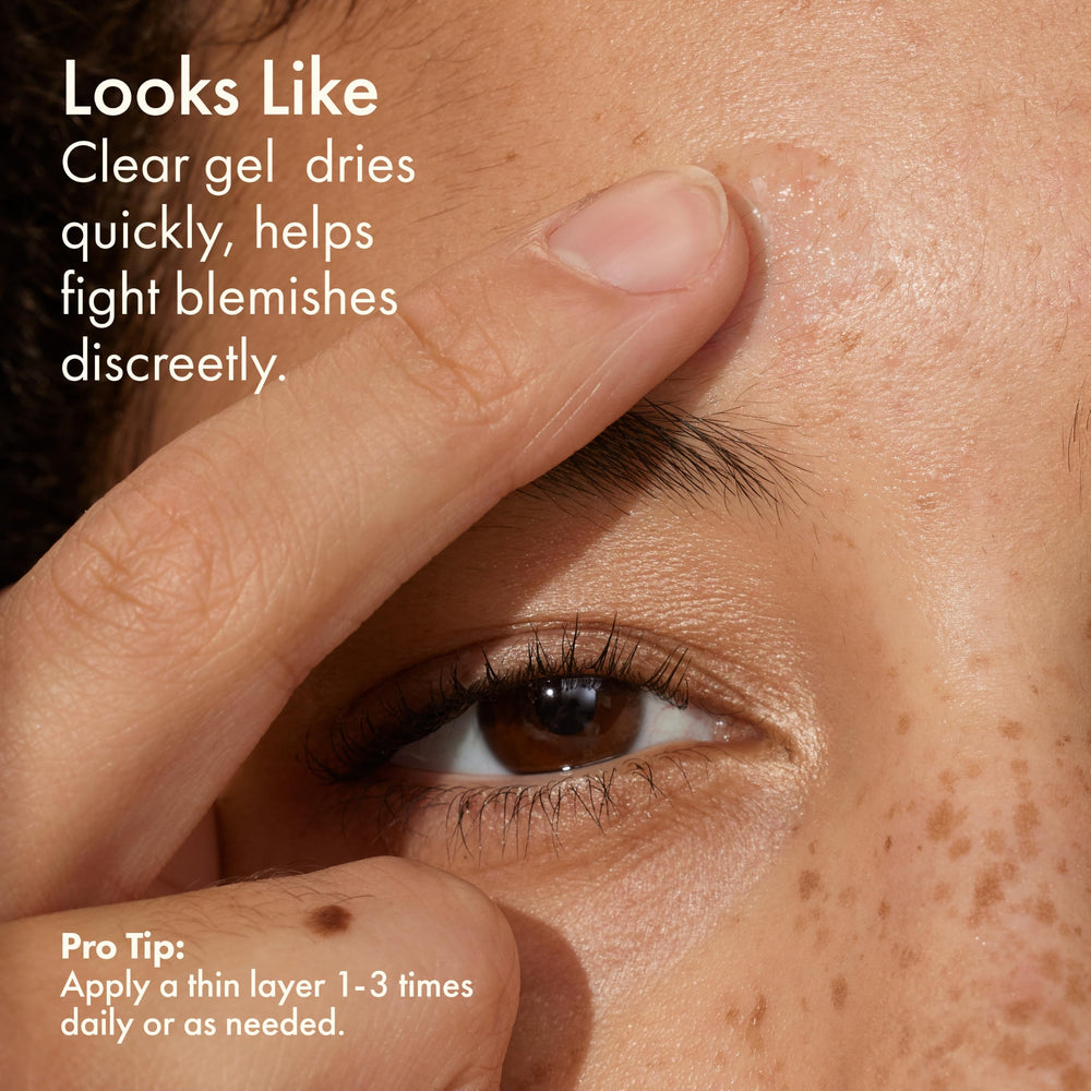 Origins applying spot treatment to blemish for focused reduction benefit
