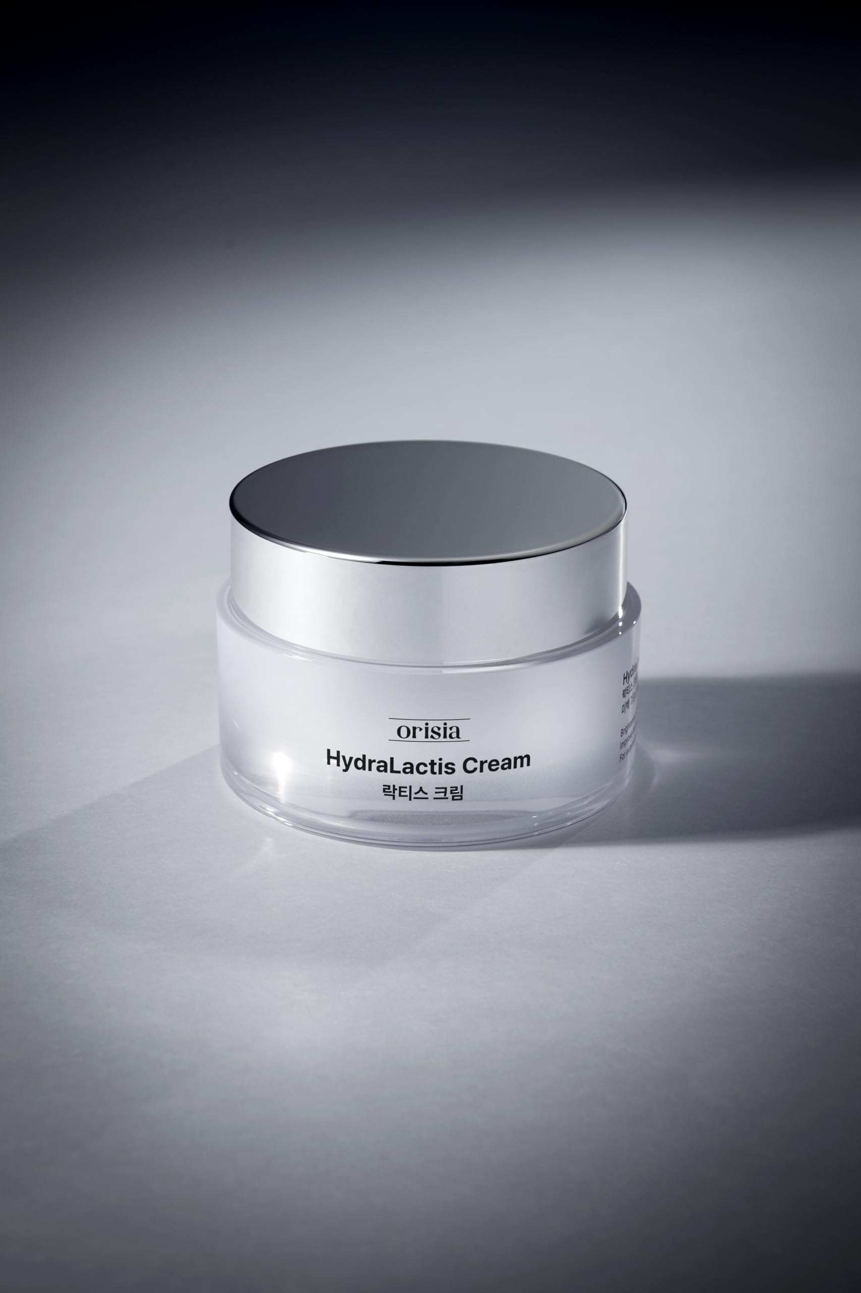 ORISIA HydraLactis ingredient label highlighting niacinamide and glutathione benefits