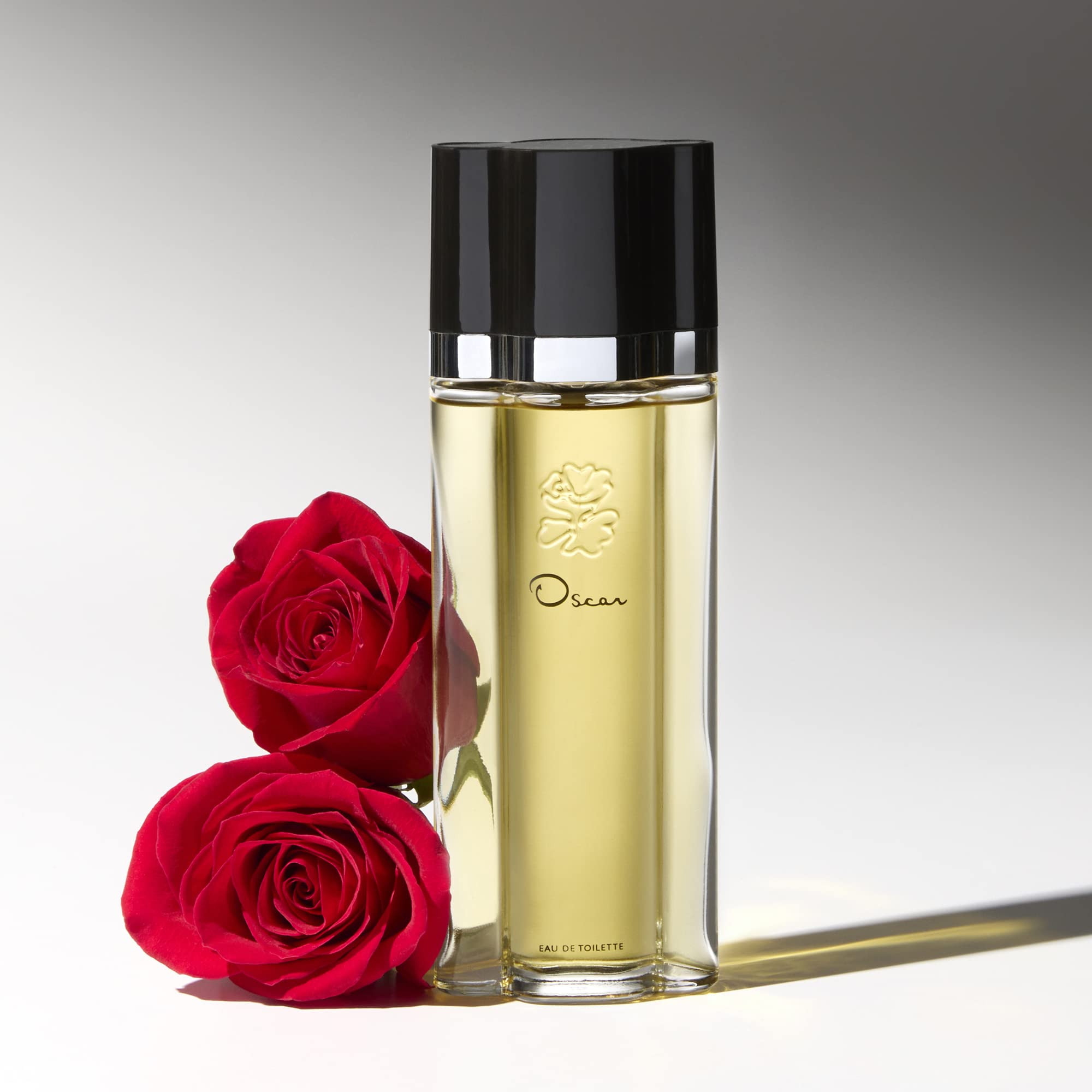 Oscar de la Renta lifestyle on dresser evoking romantic, elegant wearing occasions