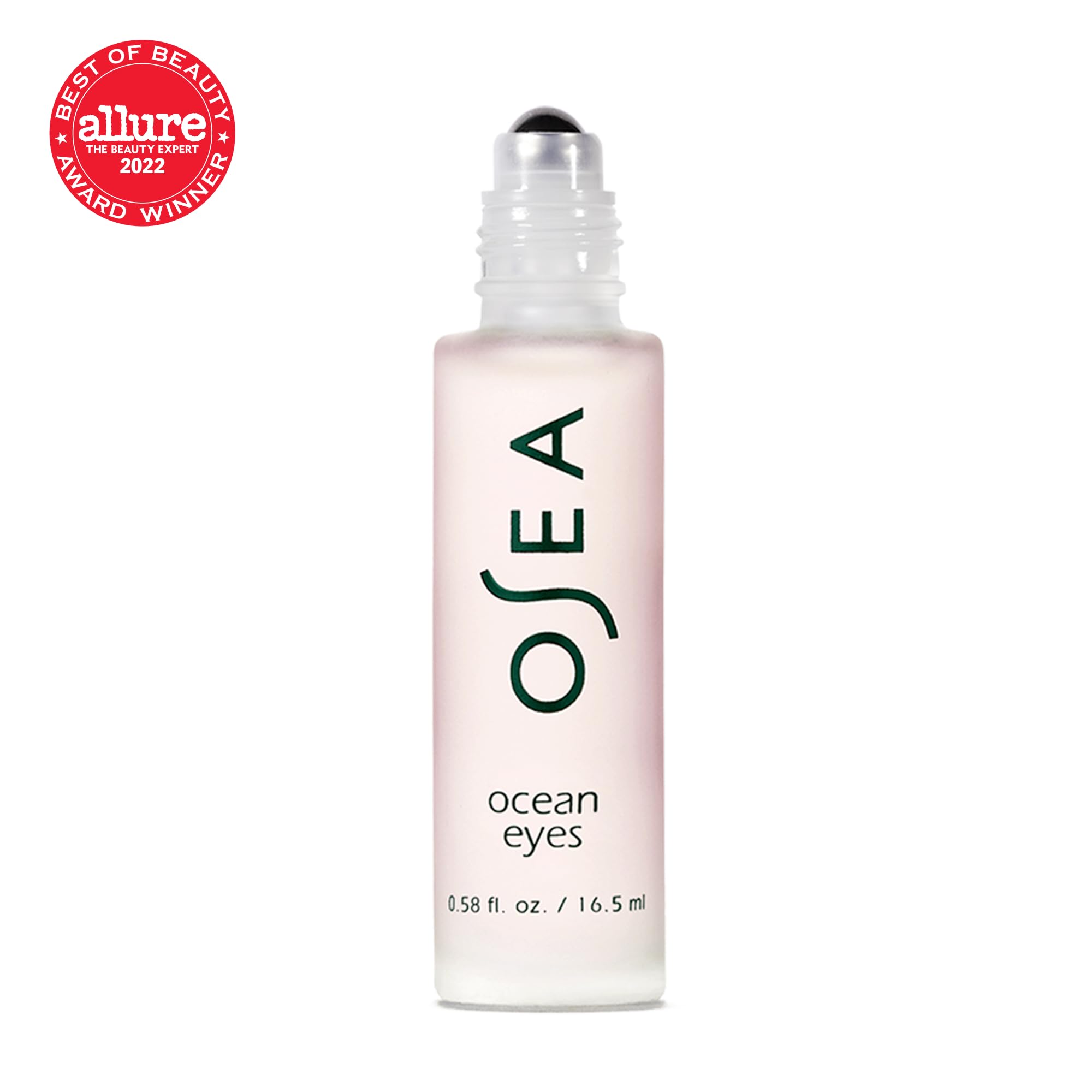 OSEA product being rolled under eye to visibly reduce puffiness and lines