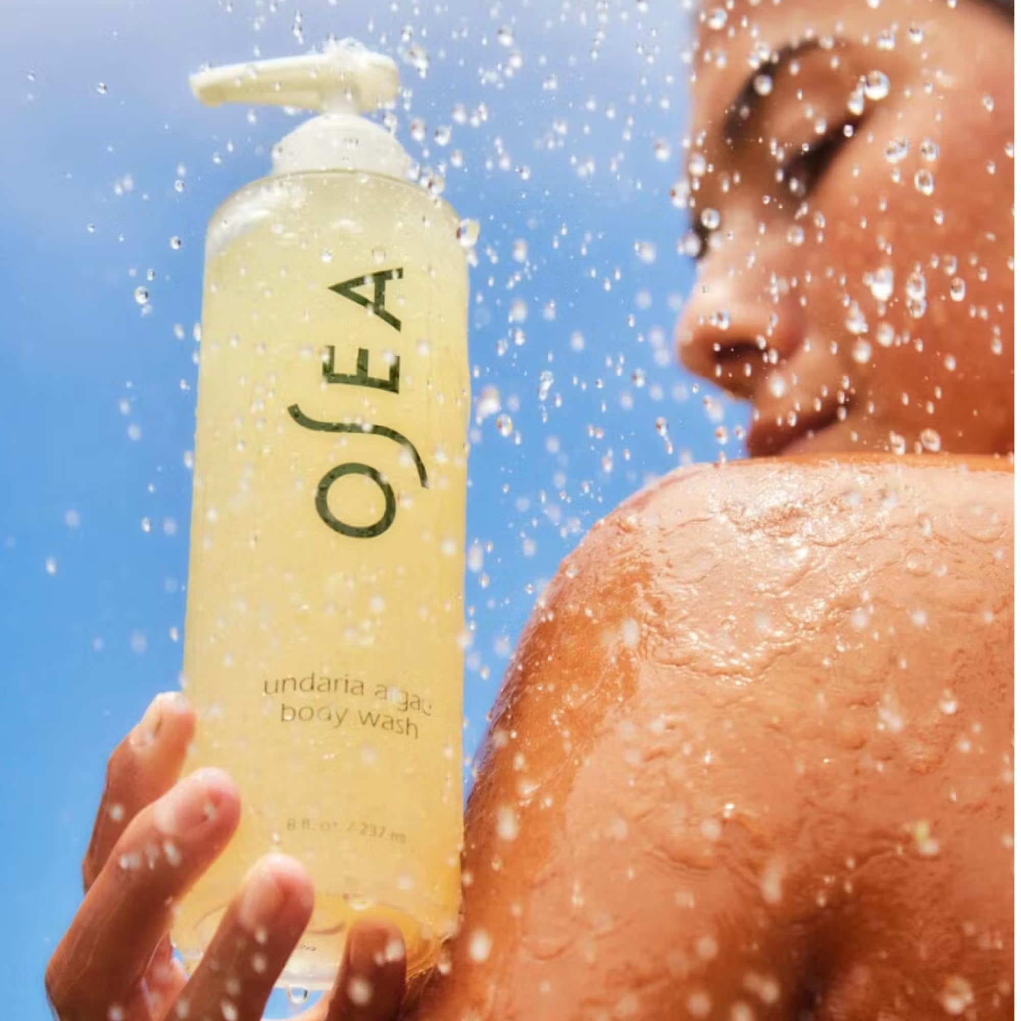 OSEA bottle on shower shelf showing daily-use convenience and spa feel