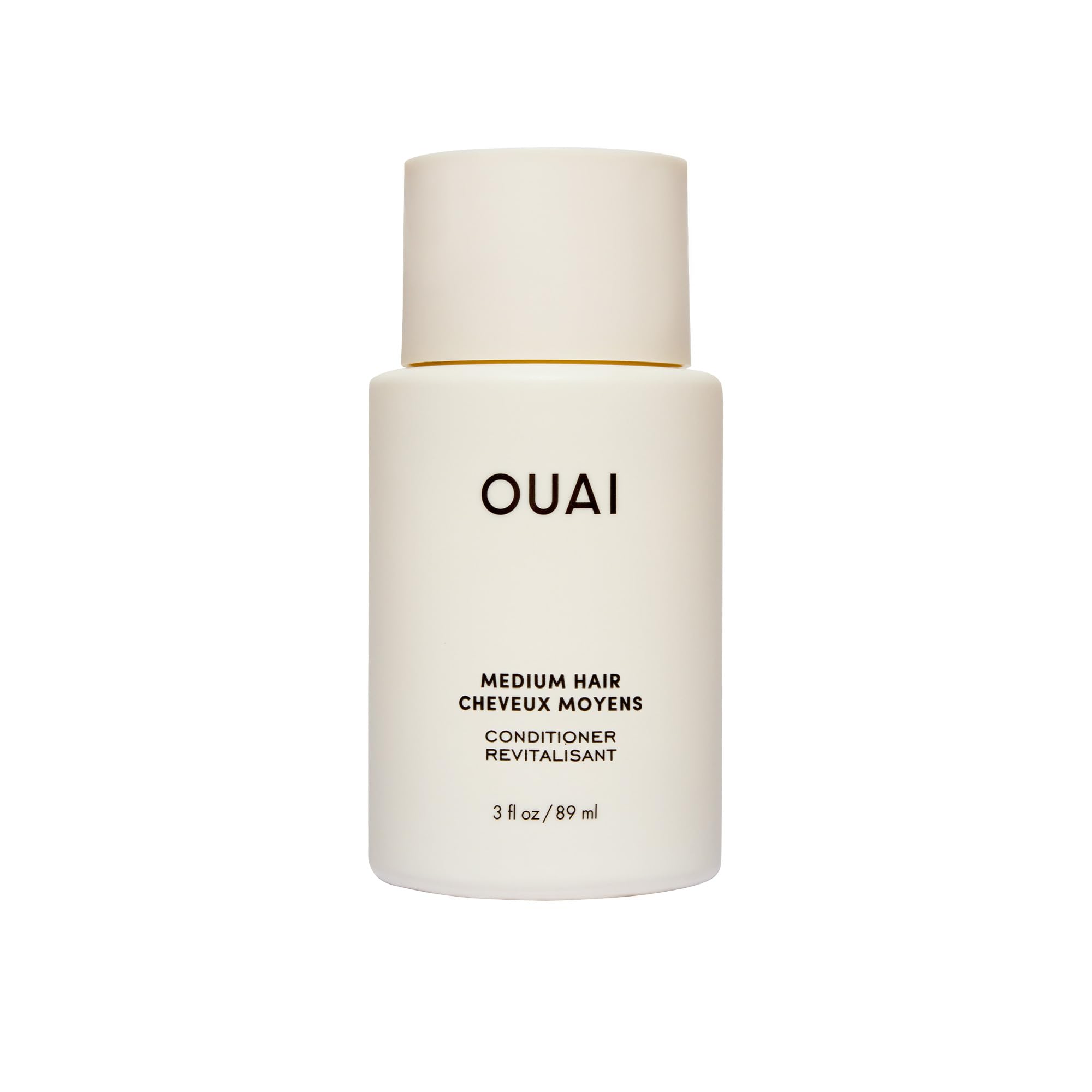 OUAI front bottle showing travel-size packaging and portability benefit