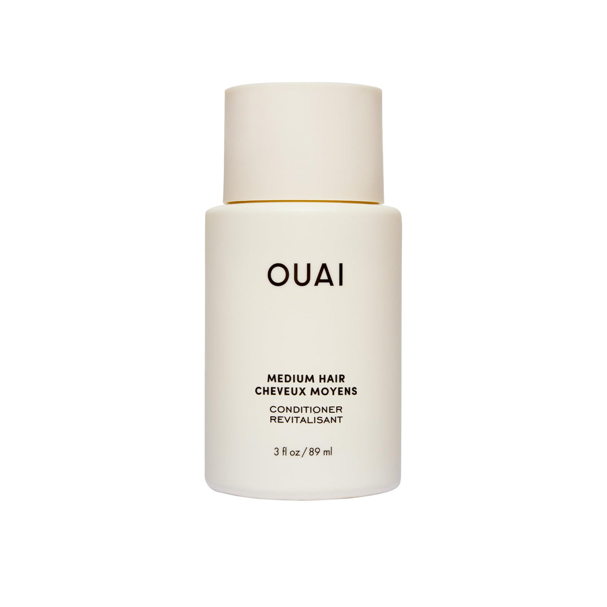 OUAI front bottle showing travel-size packaging and portability benefit