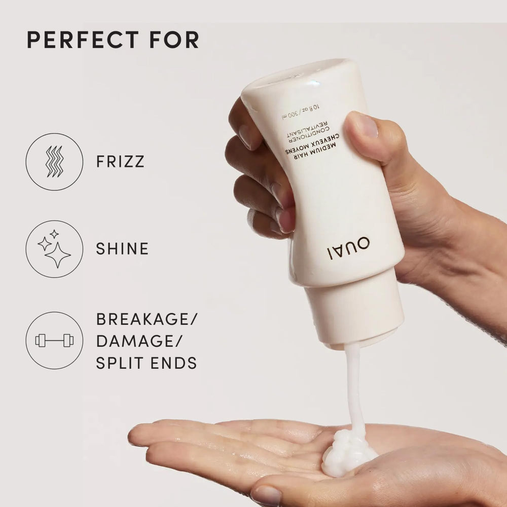 OUAI conditioner applied to mid-length hair showing improved manageability