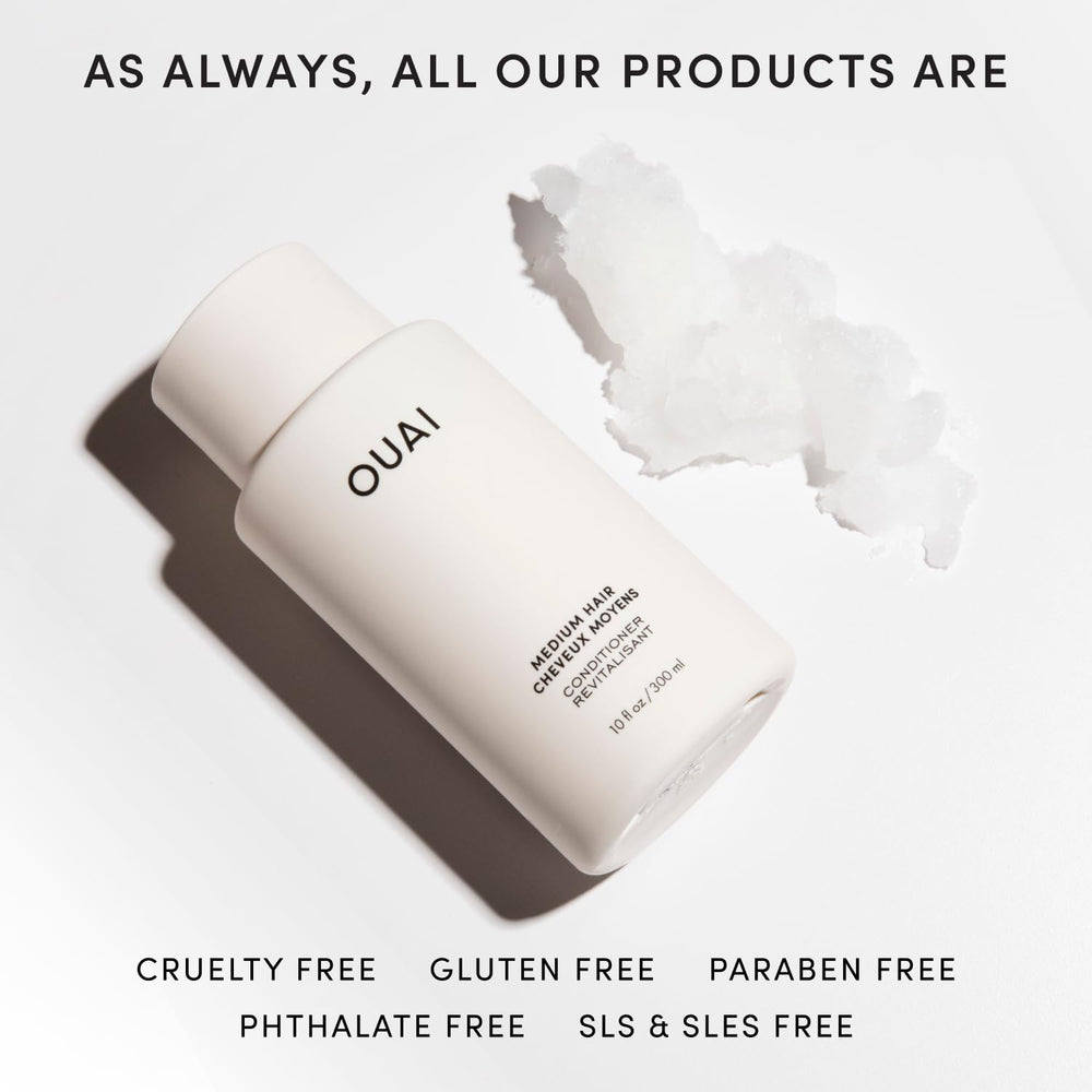 OUAI 32 oz refill beside regular bottle illustrates long-lasting supply