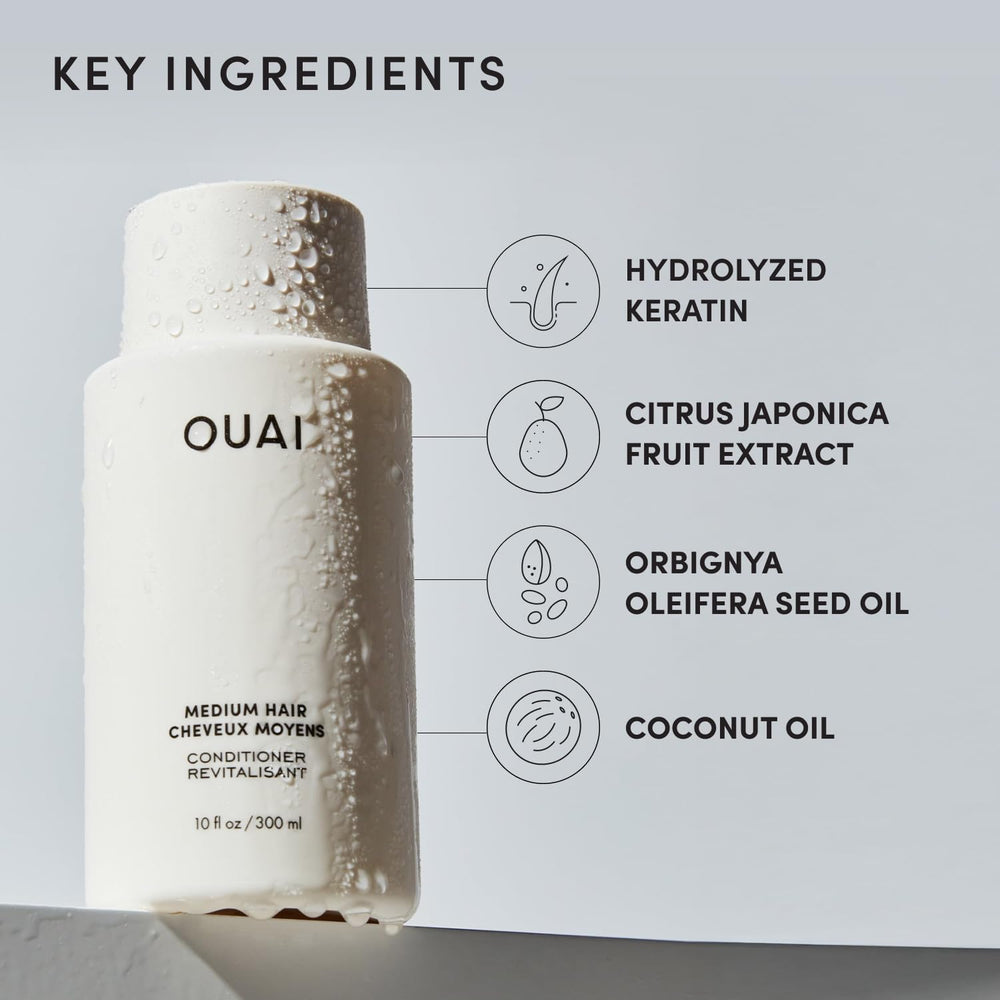 Stylist applying OUAI conditioner in shower for efficient salon-style care